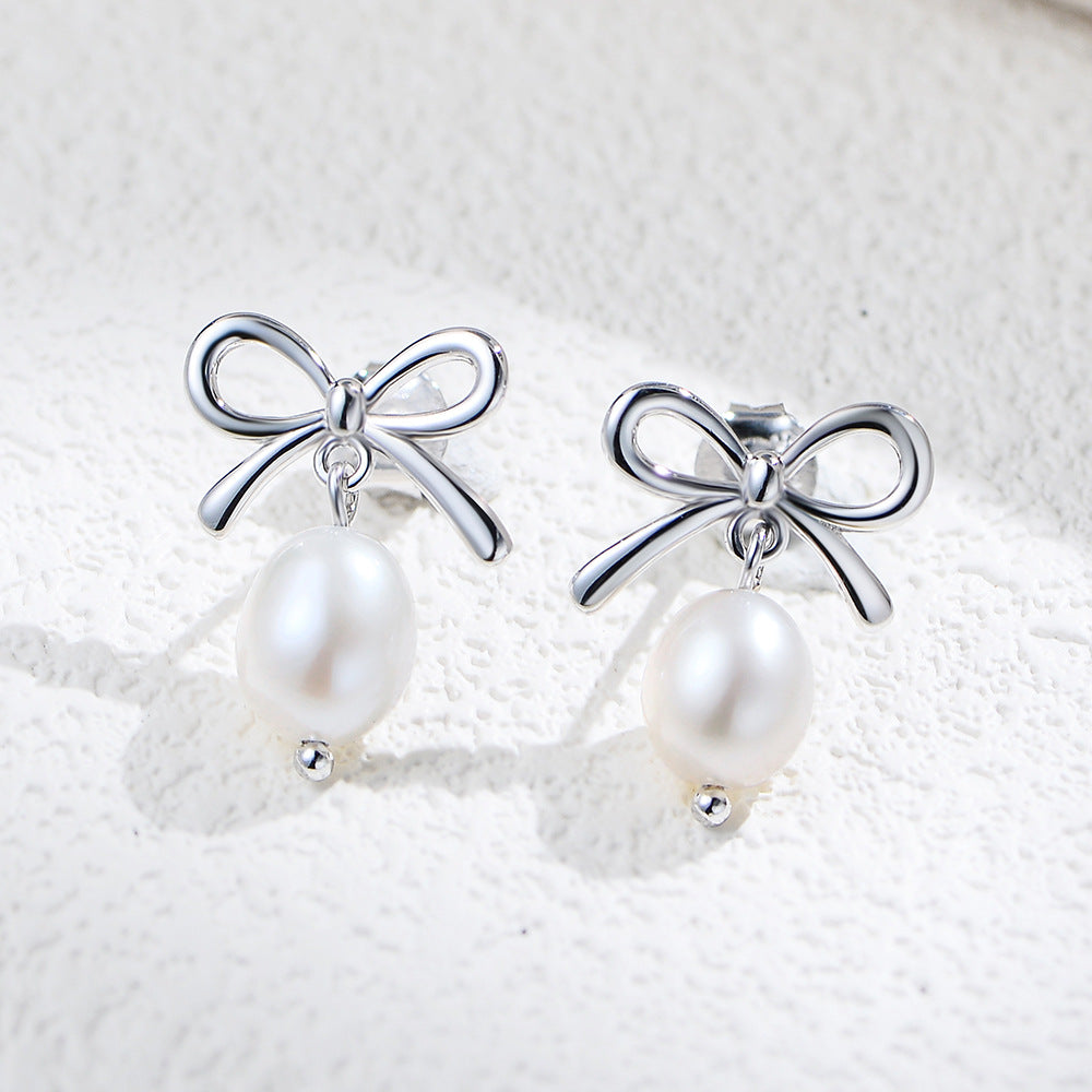 Nuba Pearl Bow Earrings