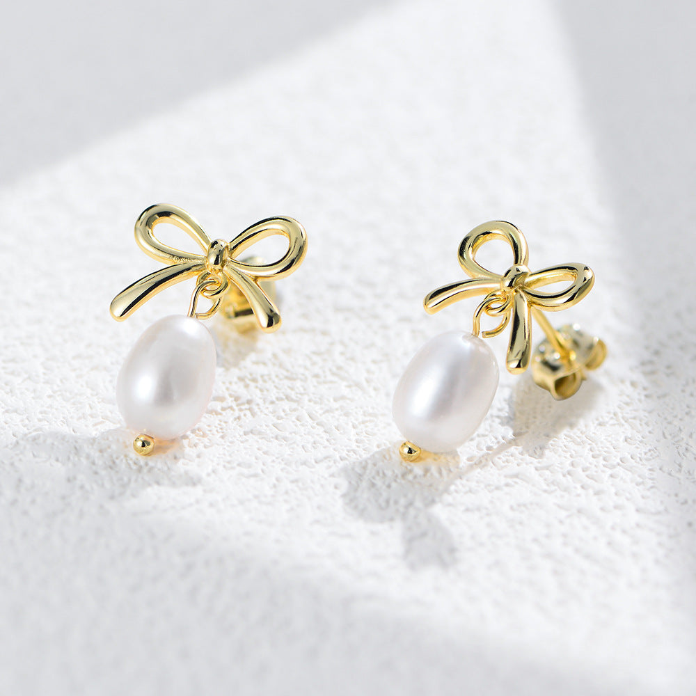 Nuba Pearl Bow Earrings